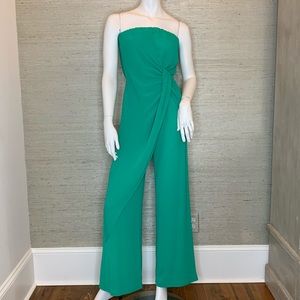 Green jumpsuit with knot detail